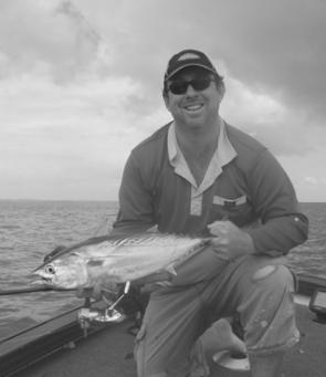 Shayne McKee with a typical Moreton Bay mack tuna caught on a small slug.